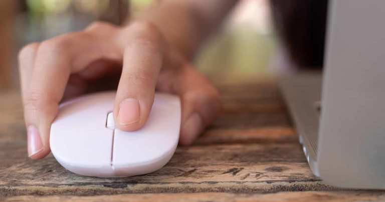 MacOS kółko myszki przewija w drugą stronę